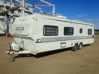 1983 Jayco Jayswan 29 Ft. T/A Travel Trailer c/w 2 5/16 In. Ball Hitch, 30 Amp, Wedgewood Stove, Dometic RM760 Fridge, Ventline Range Hood, (1) Bedroom, Bathroom, Couch, Jayco Pump/Tester, (2) Propane Tanks (May Require Recertification), Power Fist 2,250 Lb. Cap. Trailer Jack, Duotherm 24,000 BTU/HR Furnace, GVW 4,560 Lb., ST205/75R14 Tires, VIN D1DV0135 *Note: Floor Soft In Bedroom, Working Condition Unknown On Appliances and Furnace* 