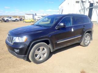 2012 Jeep Grand Cherokee Laredo 4X4 SUV c/w 3.6L VVT V6, A/T, Heated Seats, Leather, Sunroof, Back Up Camera, Hitch Receiver, Cargo Cover, Remote Keyless Entry, 265/60R18 Tires, Showing 260,492 Kms, VIN 1C4RJFAG7CC183404 *Note: Carfax In Document Tab, Windshield Cracked* 