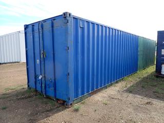 40ft Storage Container C/w Dismantled Storage Building *Note: Hole In Roof, Has Damage, Buyer Responsible For Loadout*