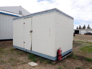 14ft X 8ft X 8ft 7in Skid Mtd. Insulated Storage Container C/w 15ft Skid And Shelving *Note: Damage On Door, Buyer Responsible For Loadout*