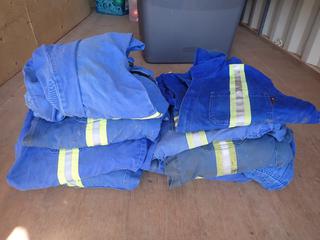 Qty Of Assorted Size Coveralls