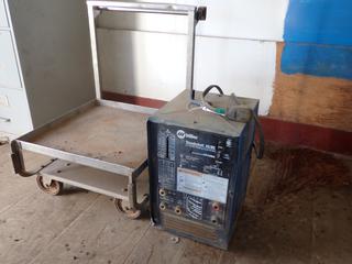 Miller Thunderbolt 230V Single Phase CC.AC/DC Welding Power Source, SN KH404052 C/w 21 1/2in X 21 1/2in X 13in Cart *Note: Working Condition Unknown*