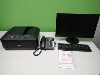Acer 23 In Monitor, Canon Copy/Scan/Fax Printer, Logitech Keyboard and Nortel Office Phone.
