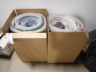 (2) Boxes of Plastic Back Drops.