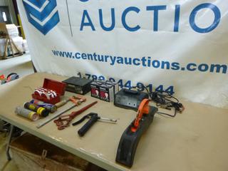 Qty of Misc. Items Includes MotoMaster Battery Charger, Light Bulbs, Bessy Clamp, Reflective Lights, Grease, Chain Load Binder and Other Assorted Items (F-2)