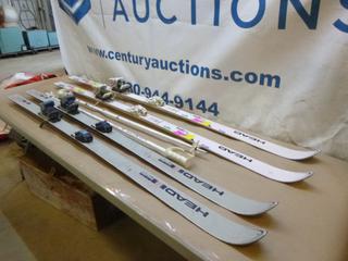 (1) Set of Head RX360 Skis w/ Pole and Bag, C/w (1) Set of Head Calgary 88 Radial SL Skis  (G Back Wall)