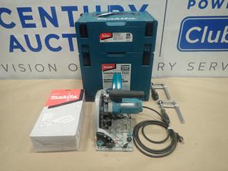 Makita SP6000, 120V, 6 1/2 In. Plunge Circular Saw C/w Makita Miter Guide Set To Fit SP6000, (2) Makita 4 In. Bar Clamps, (1) Makita XL And (1) Medium Interlocking Case (N23)