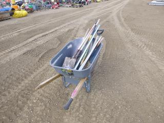 Assortment of Misc. Items Includes Wheel Barrow , Shovels, Sledge Hammer, Level and Other Items * Note: 1 Handle is Missing*