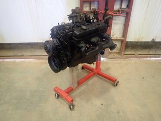 Chevrolet 5.7L 350 Engine From 1994 Chevrolet Silverado, Runs, Has 274,000 Kms As Per Consignor c/w MVP Pro-Lift 750 Lb. Engine Stand *Note: Missing Small Accessories and Sensors*  (NE Floor)