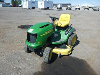 2003 John Deere L130B Ride On Tractor c/w 23 HP Gas, 16x6.50-8 NHS Front, 22x9.50-12 NHS Rear Tires, S/N GXLI130B011663. No Battery.