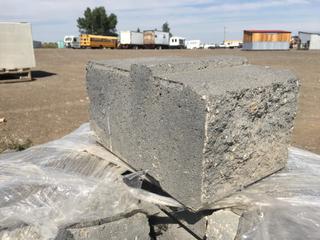 Interlocking Grey Landscaping Bricks, Approximately 12 In x 8 In x 6 In.