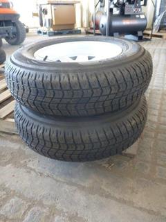 (2) Roadguider QH500 Trailer Tires ST205/75 D14 w/ White Steel Rims.