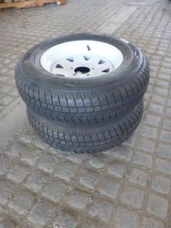 (2) Roadguider QH500 Trailer Tires ST205/75 D14 w/ White Steel Rims.