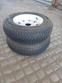 (2) Roadguider QH500 Trailer Tires ST205/75 D14 w/ White Steel Rims.