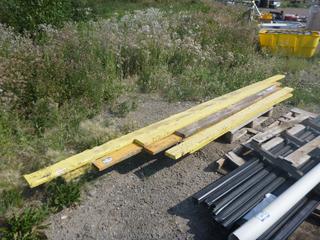 Quantity of Assorted Lengths of Lumber Painted Yellow.