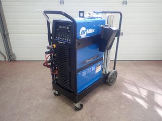 2015 Miller Dynasty 350 208-575V 1/3-Phase AC/DC Water Cooled TIG Welder C/w TIG Gun, Ground Cable, Smith Flowmeter, Miller Wireless Foot Control And Cart. SN MF470219L