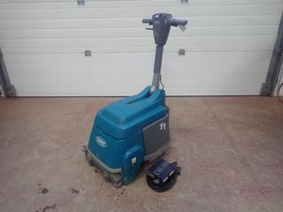 Tennant Model T1B 12VDC 550W Floor Scrubber C/w Charger. Showing 71hrs. SN 900863-10569837