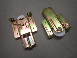 (2) Boxes of COX Bottom Roller Axle Protruding Wheel Bypassing Door Hardware, No. 21-718, 25 Pairs Per Box.