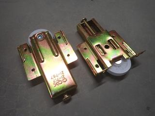 (2) Boxes of COX Bottom Roller Axle Protruding Wheel Bypassing Door Hardware, No. 21-717, 25 Pairs Per Box.