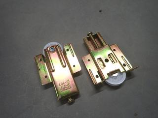 (2) Boxes of COX Bottom Roller Axle Protruding Wheel Bypassing Door Hardware, No. 21-717, 25 Pairs Per Box.