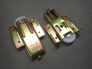 (2) Boxes of COX Bottom Roller Axle Protruding Wheel Bypassing Door Hardware, No. 21-717, 25 Pairs Per Box.