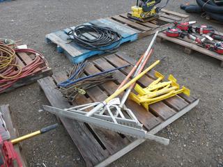 (3) Landscape Rakes, (1) Concrete Rake and QLT 16 In Paving Stone Lifters.