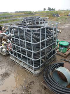 Metal Cage Containing Hydraulic Hoses.