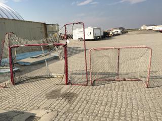 (1) Hockey Net 5 Ft x 44 In, (1) EZ Goal Hockey Net 6 Ft x 4 Ft w/ 22 In Surround Netting.