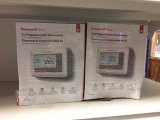(2) Honeywell T4 Programmable Thermostats.