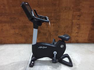 Life Fitness Model 95CS Life Cycle Inspire Upright Bike c/w KOPS Leg Position, Programmed Workouts & Touchscreen Display. S/N APU115387.