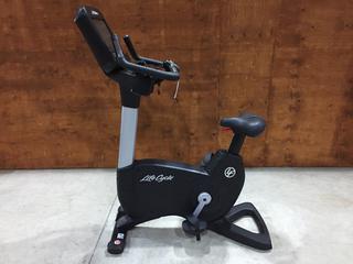 Life Fitness Model 95CS Life Cycle Inspire Upright Bike c/w KOPS Leg Position, Programmed Workouts & Touchscreen Display. S/N APU118559.