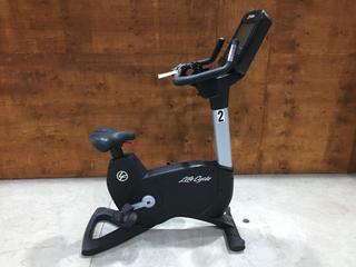 Life Fitness Model 95CS Life Cycle Inspire Upright Bike c/w KOPS Leg Position, Programmed Workouts & Touchscreen Display. S/N APU110209.