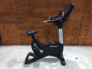 Life Fitness Model 95CS Life Cycle Inspire Upright Bike c/w KOPS Leg Position, Programmed Workouts & Touchscreen Display. S/N APU110213.