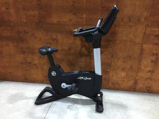 Life Fitness Model 95CS Life Cycle Inspire Upright Bike c/w KOPS Leg Position, Programmed Workouts & Touchscreen Display. S/N APU114831.