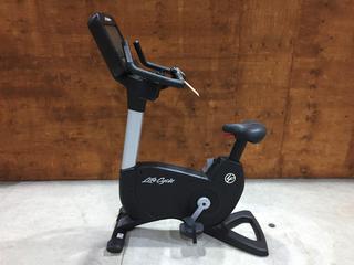Life Fitness Model 95CS Life Cycle Inspire Upright Bike c/w KOPS Leg Position, Programmed Workouts & Touchscreen Display. S/N APU114598.