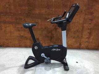 Life Fitness Model 95CS Life Cycle Inspire Upright Bike c/w KOPS Leg Position, Programmed Workouts & Touchscreen Display. S/N APU114833.