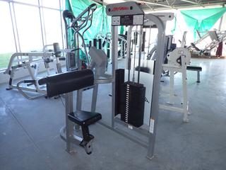 Selling Offsite -  Life Fitness SU75 Arm Curl, S/N 67836. Located at 100 Gateway Drive NE, Airdrie, For More Information Please Call Graham @ 403-968-7697.