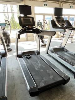 Selling Offsite -  Life Fitness 95T Treadmill 120V 60Hz 18A S/N AST111122. Located at 100 Gateway Drive NE, Airdrie, For More Information Please Call Graham @ 403-968-7697.