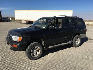 1997 Toyota 4-Runner 4x4 SUV c/w 3.4L V6, Auto, A/C, Rear Diff. Lock, 235/65R16 Tires, Showing 450,454 Kms,  VIN JT3HN87R9V0115151. *Note: Front Seats Ripped, Drive Side Mirror Taped, No Front Grill, Deflectors Broken, Center Console Broken, Cracked Windshield, No Fender Flares On Driver Side, Many Dents.
