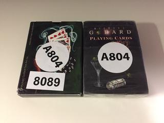 (2) Michael Godard Playing Cards.