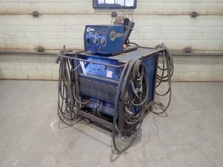 2011 Miller Dimension 302 230/460/575V 3-Phase CC/CV.DC Welding Power Source, SN MB010557U C/w Cable And Miller 24V Wire Feeder, SN MB140001V  *Note: Working Condition Unknown, Stick Do Not Work As Per Owner*