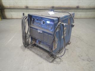 1997 Miller Dimension 302 230/460/575V 3-Phase CC/CV.DC Welding Power Source C/w Cable. SN KH336956