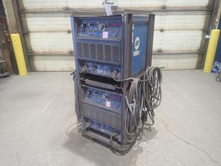 (2) 1997 Miller Dimension 302 230/460/575V 3-Phase CC/CV.DC Welding Power Sources C/w Cable And Stand. SN KH330303, SN KH336963