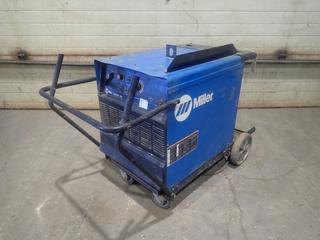 2011 Miller Dimension 302 230/460/575V 3-Phase CC/CV.DC Welding Power Source C/w Cart. SN MB320063U *Note: Working Condition Unknown*