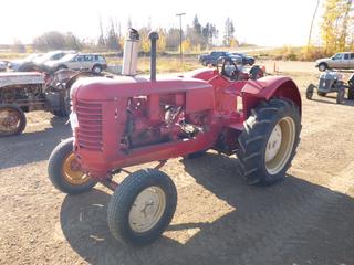 1944 Massey Harris 102JS 2WD Tractor c/w 4 Cyl, 4 Speed, 540 PTO, Drawbar, Belt Pulley, Zenith Carburetor, SN 381966 *Note: Starts When Fuel Put In Carburetor As Per Consignor* (PL0783)