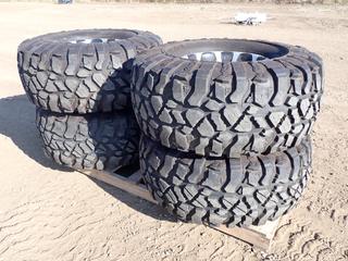 (4) Pit Bull Rocker 44X19.50-20 LT Tires w/ 20 In. Aluminum, 8 Bolt Rims
