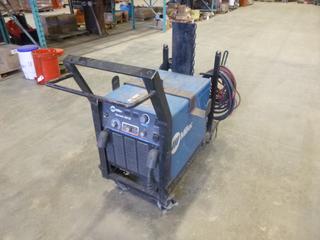 Miller Shopmate 300 DX Welder c/w 230/460/575 Volts, 57/29/23 Amps, 11.2 KW, 60 Hz, Single-Phase w/ Qty of Cables, Hose, and Cart, SN LK100310N (P11)