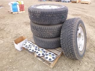 (3) Toyo Open Country 265/70R17 Tires on 6 Bolt Rims C/w (1)  Hankook Dynapro P265/70R17 Tire on a 6 Bolt Rim (OS)