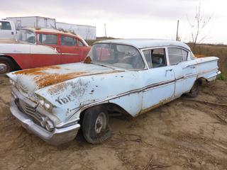 1958 Chevrolet Biscayne C/w Inline 6-Cyl, A/T. *Note: Running Condition Unknown* **Located Offsite at 21220-107 Avenue NW, Edmonton, For More Information Contact Richard at 780-222-8309**