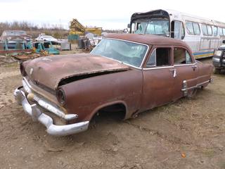 1953 Ford Customline 4-Door Sedan  C/w V8, A/T. Showing 4799 Miles. *Note: Running Condition Unknown* **Located Offsite at 21220-107 Avenue NW, Edmonton, For More Information Contact Richard at 780-222-8309**